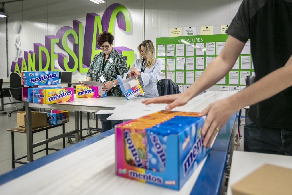Afdeling aan de slag met jobcoach en deelnemer